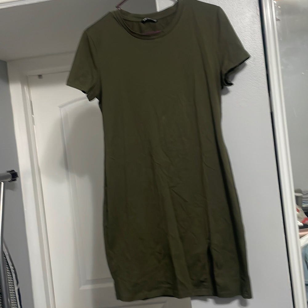 Dark Green Tee shirt dress with small split in the left corner.